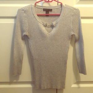 A beautiful gray blouse.